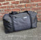 “Suit” duffel bag